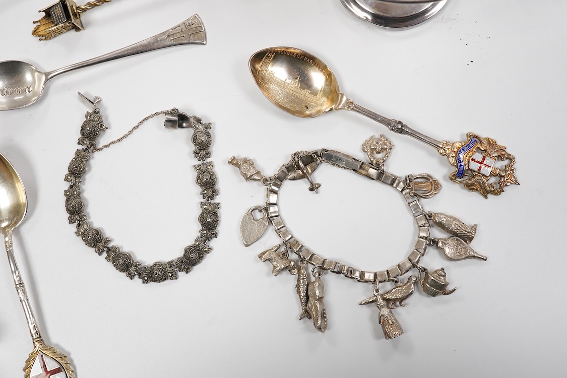 A small group of silver including an Edwardian miniature model of a throne by Edward Foligne Braham, Birmingham, 1901, 50mm, a small comport, one part of a belt buckle and three commemorative spoons, together with a gilt